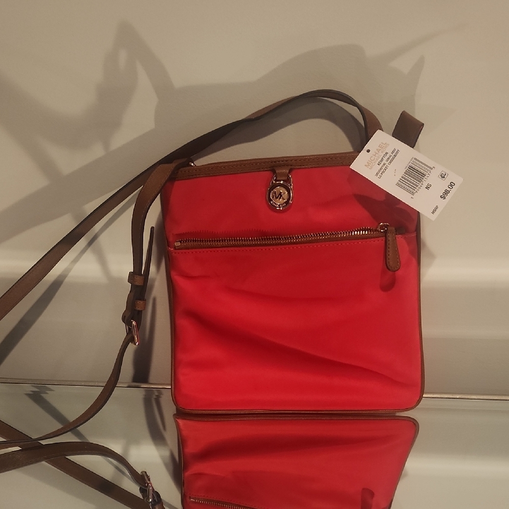 Chic Red Crossbody Bag with Brown Trim